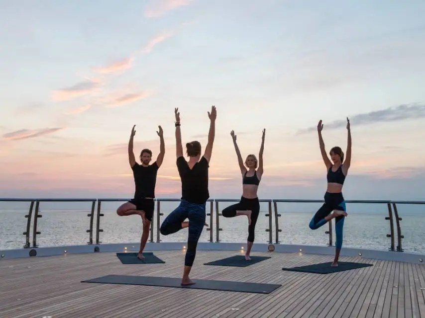 Sunrise yoga at sea wellness